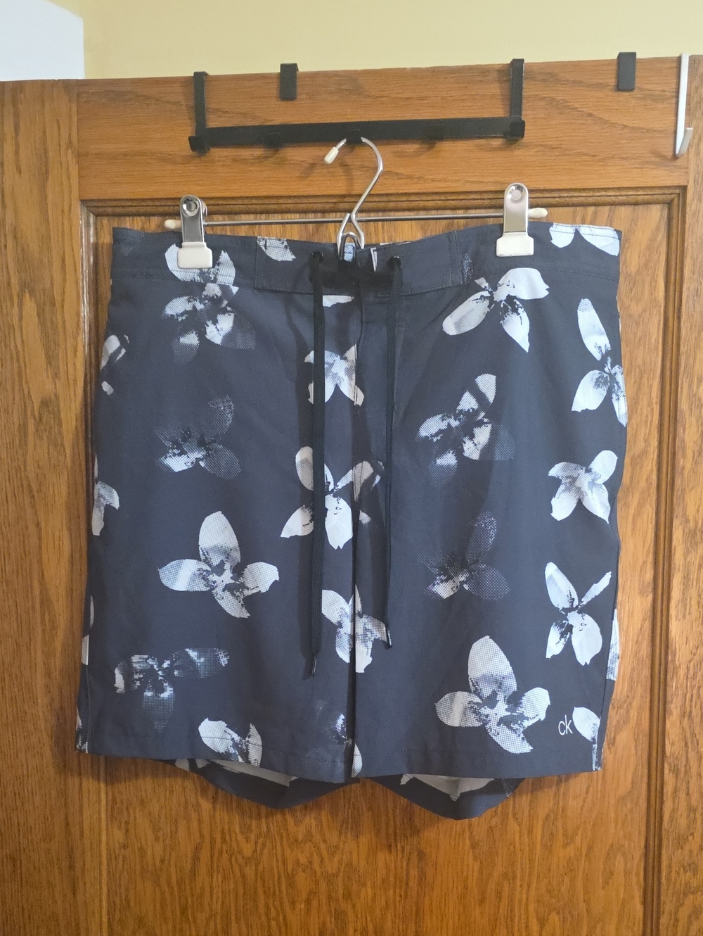 Calvin Klein Navy and White Floral Swim Trunks